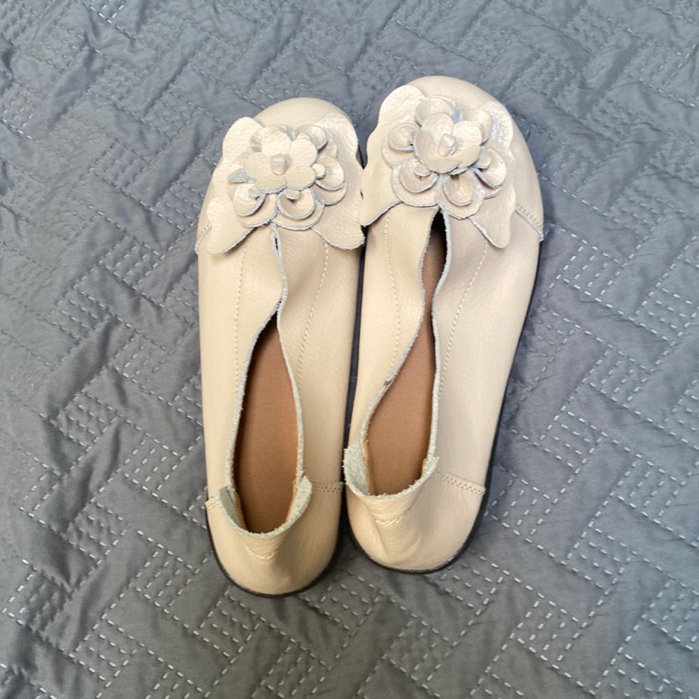 Cream leather slip on shoes